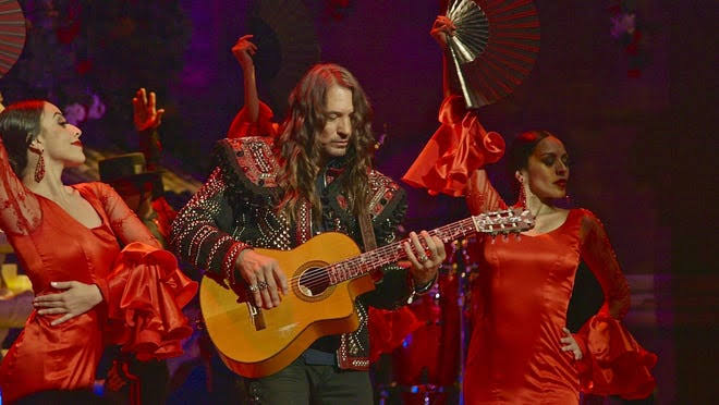 Benise performing live on stage
